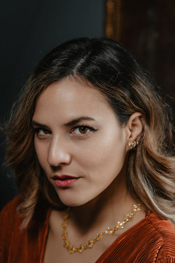 An artisan antique revival pair of solid 14k gold snake stud earrings. These snake earrings are made of pure 14 karat gold and are set with natural diamonds.  These earrings can be worn as a single stud or together as a pair. We have them both in white, rose and yellow gold, so please choose your preferred metal in the variations section.