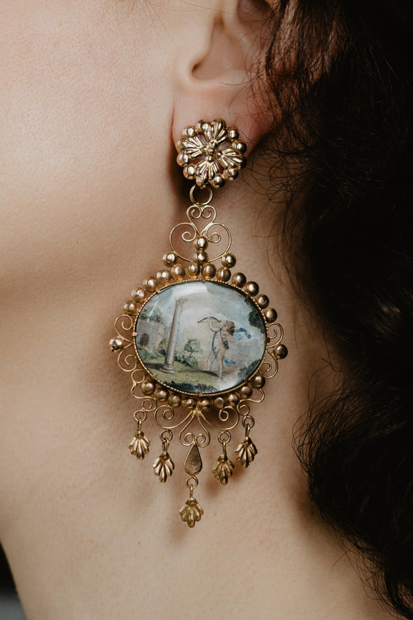 An absolutely UNIQUE and MUSEUM-WORTHY Early Victorian era cupid miniature earrings made of solid 14k yellow gold!  Coming from Italy, this almost 250 year old earrings boast an amazing decorative profile.