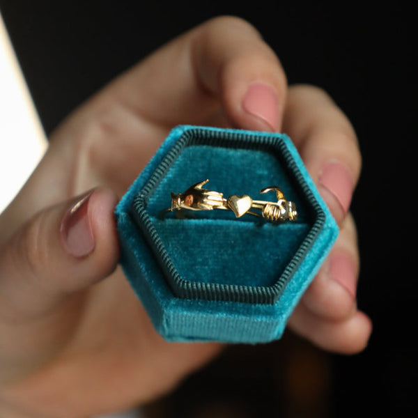 A well-preserved and highly collectible antique revival fede ring in solid 18k yellow gold!