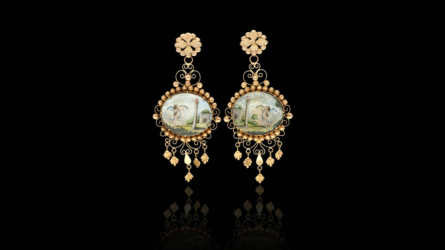 An absolutely UNIQUE and MUSEUM-WORTHY Early Victorian era cupid miniature earrings made of solid 14k yellow gold!  Coming from Italy, this almost 250 year old earrings boast an amazing decorative profile.