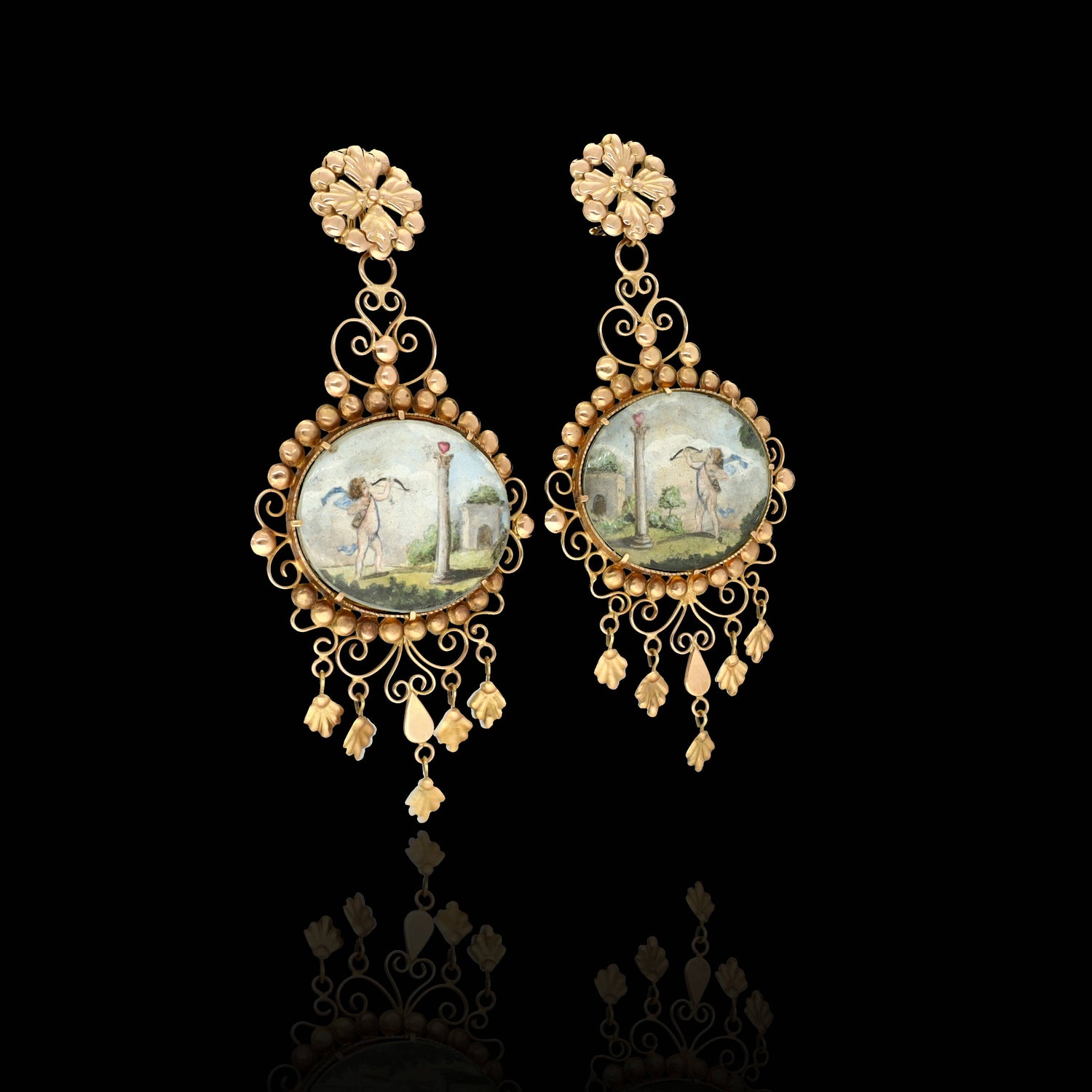 An absolutely UNIQUE and MUSEUM-WORTHY Early Victorian era cupid miniature earrings made of solid 14k yellow gold!  Coming from Italy, this almost 250 year old earrings boast an amazing decorative profile.