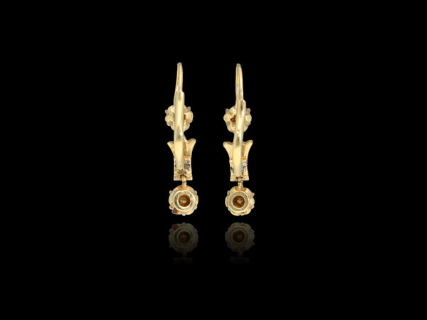 A classy and very feminine antique Victorian era pair of solid gold earrings! Made of solid 14 kt gold these earrings date back to mid-late 19th century and weight 4.3 grams.  The earrings are preserved in a superb condition.